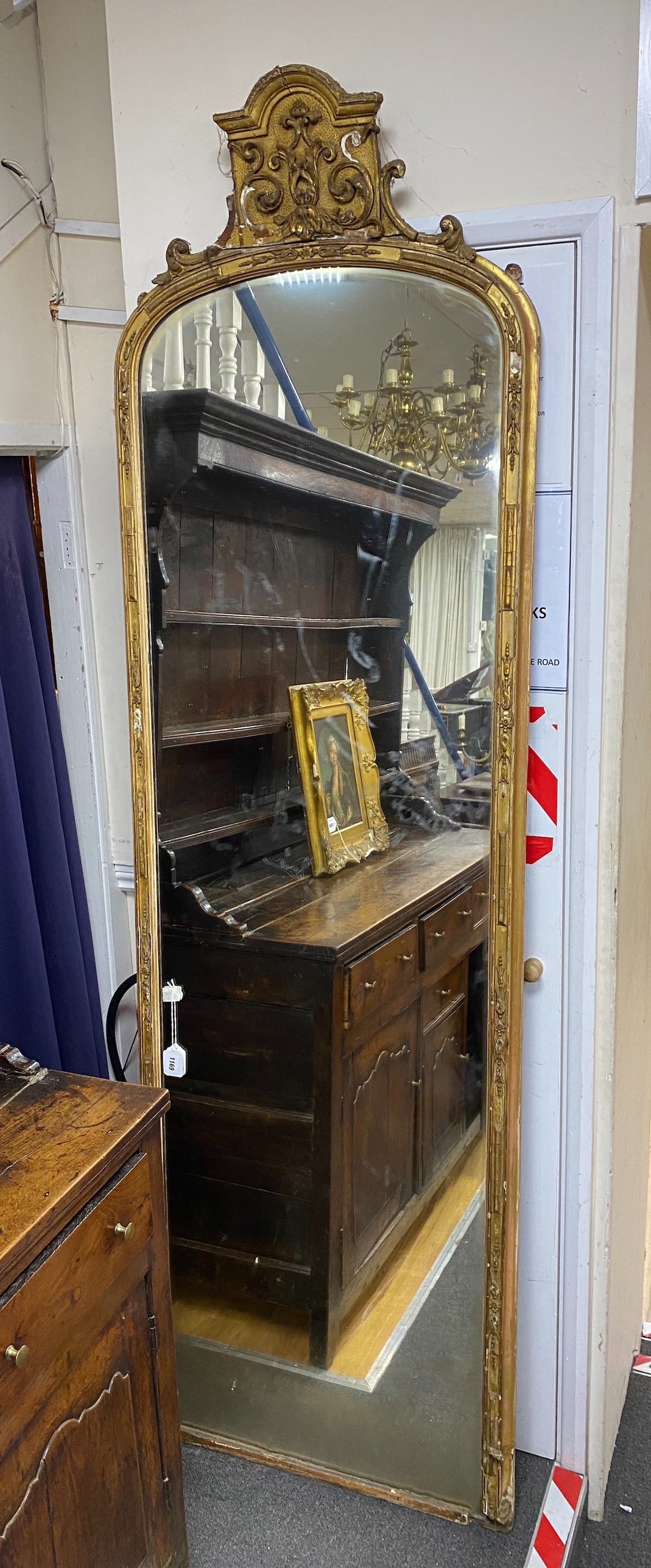 A large 19th century giltwood and gesso pier glass, width 69cm, height 227cm